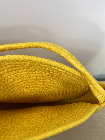 OTRAS.Bolso redondo amarillo