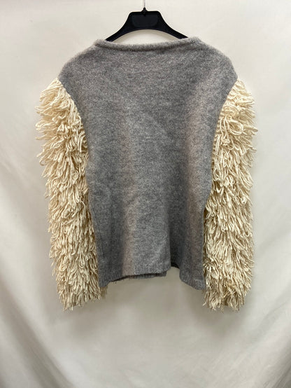 UTERQÜE.Jersey bicolor flecos T.S/M (Tara)