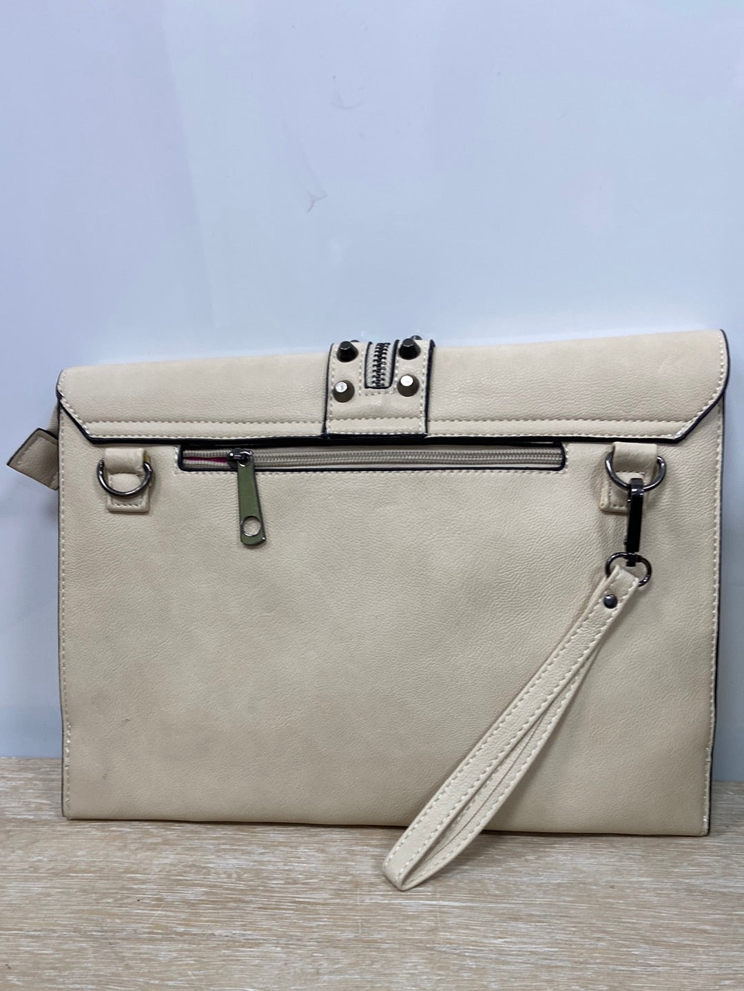 MISAKO. Beige bag with studs and zipper