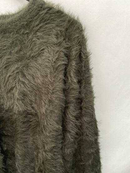 B.YOUNG.Jersey verde pelito T.XS