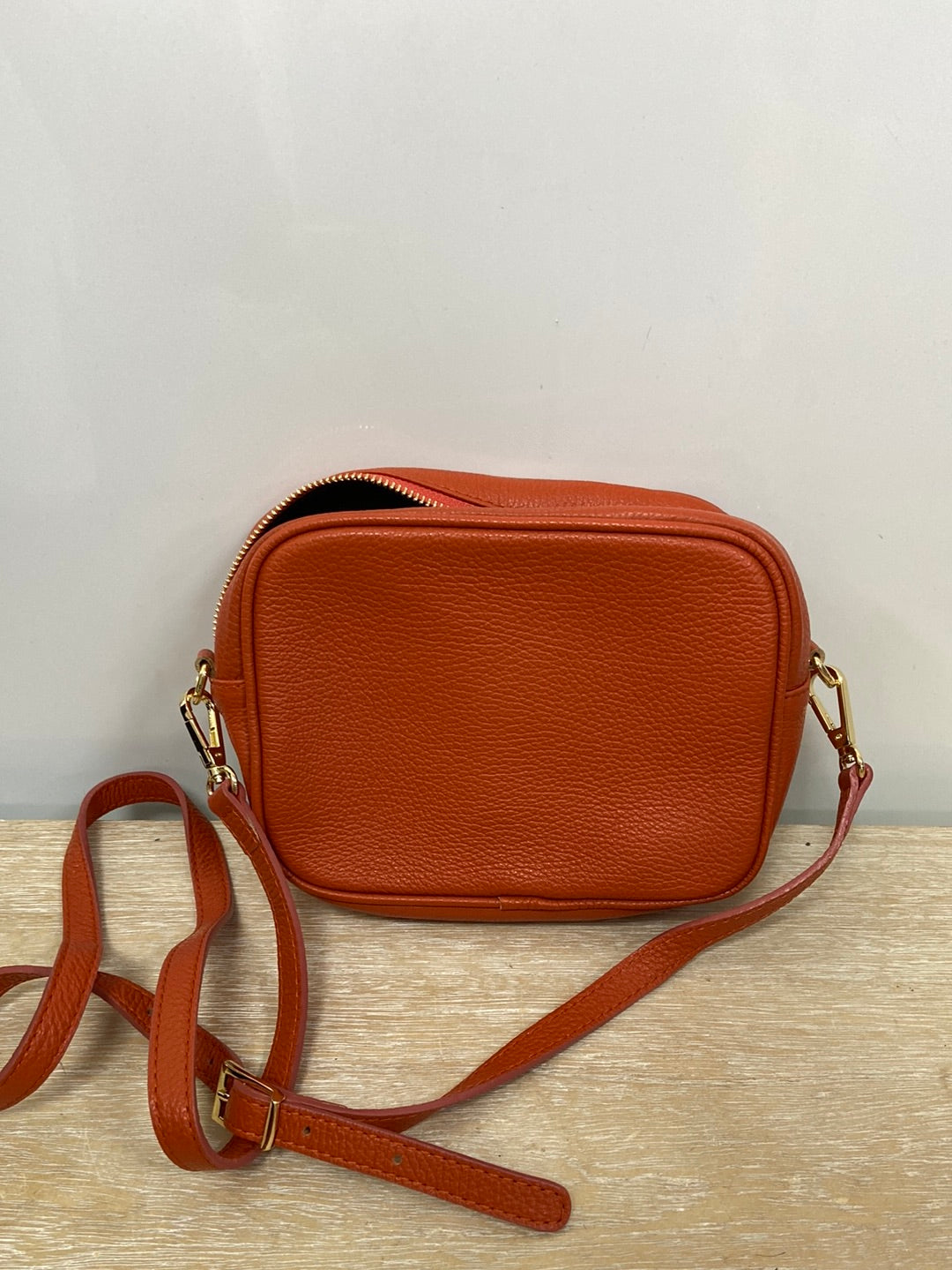 OTHERS. Orange leather bag