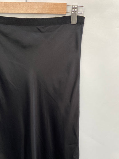 ANINE BING. Falda midi negra satinada T.34