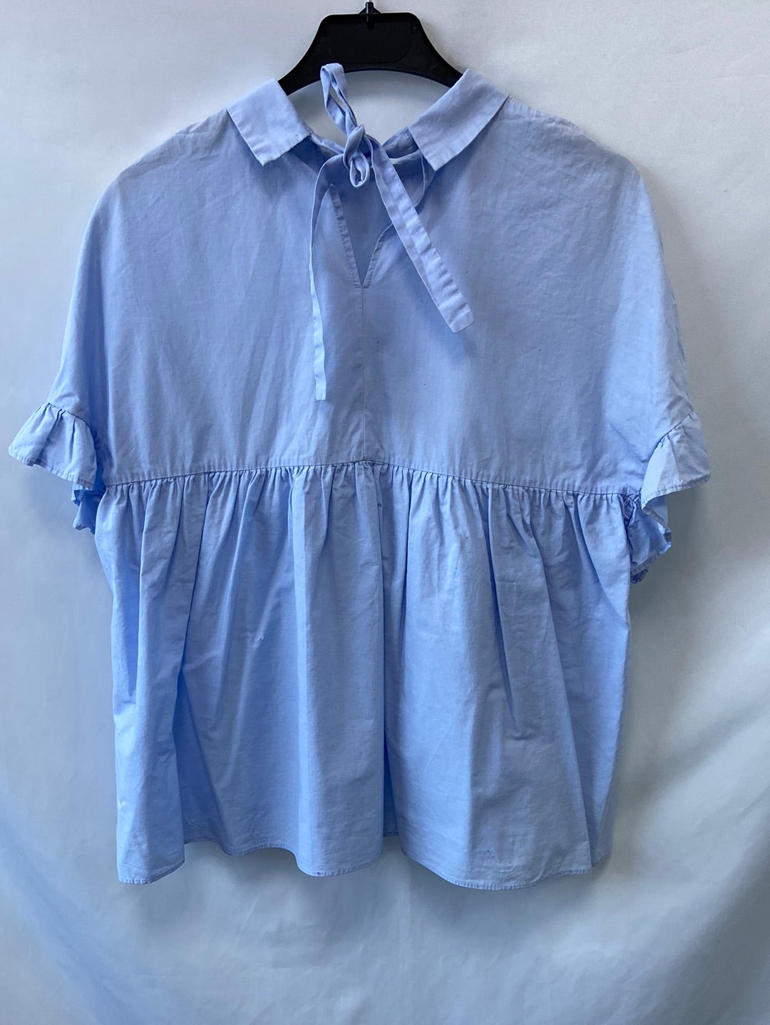 ZARA.Blusa azul volante T.M (Tara)