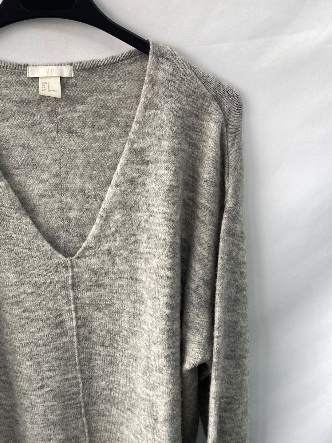 H&M.Jersey gris largo T.s