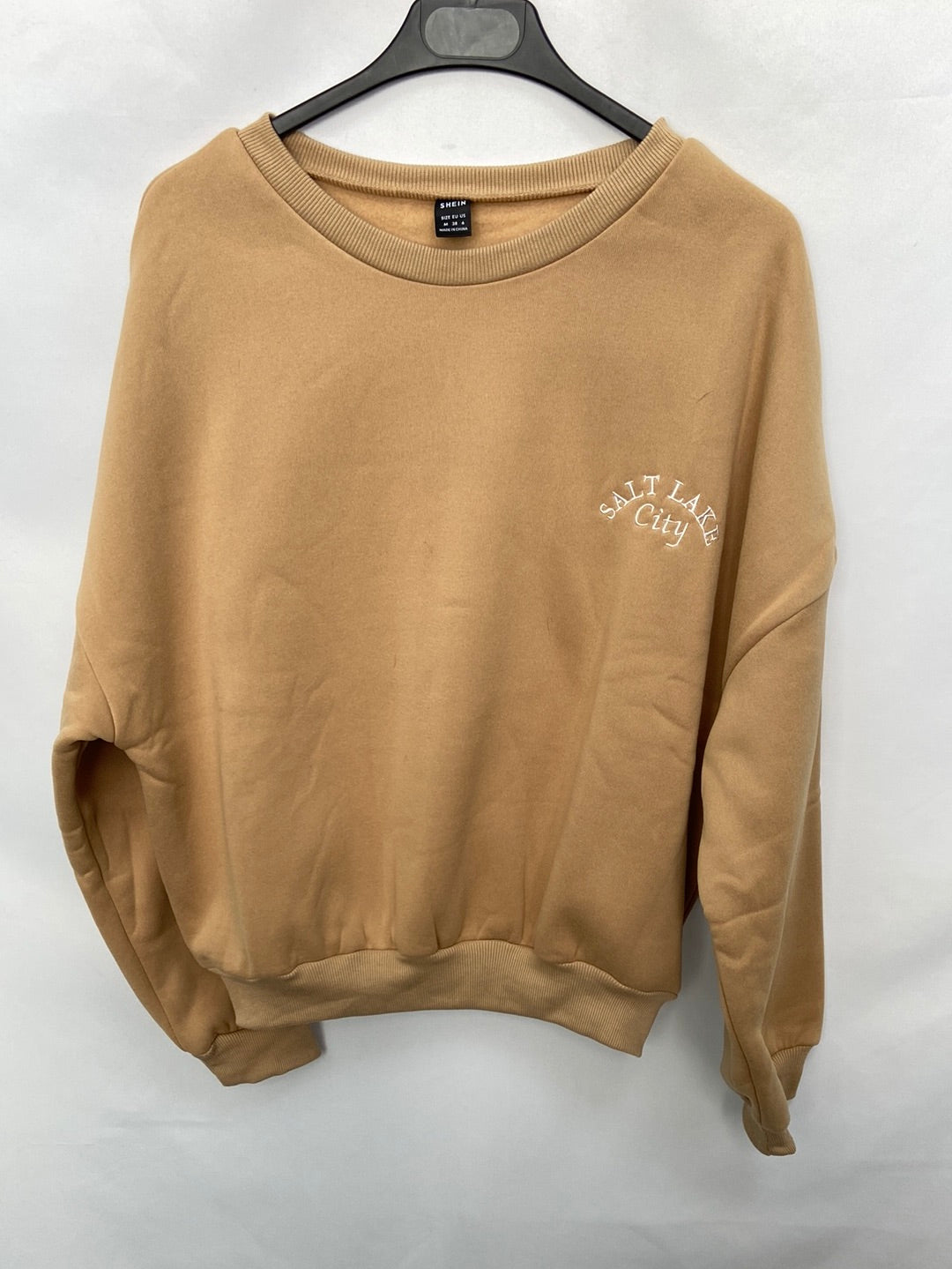 SHEIN.Sudadera camel T.M