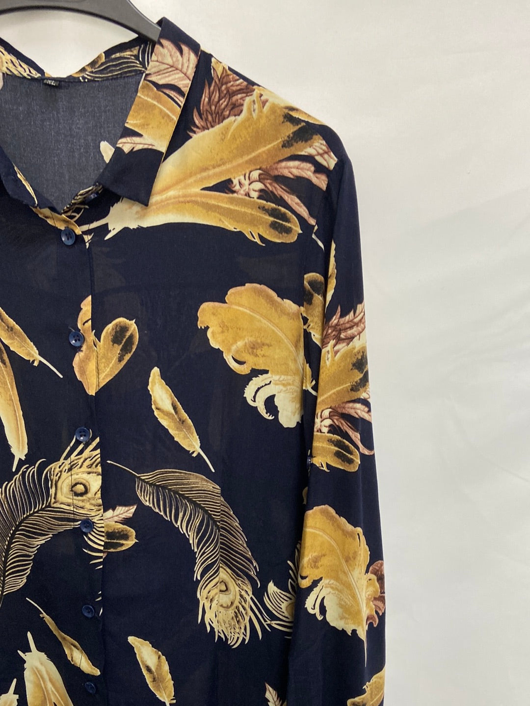 OTRAS.Blusa oversized plumas T.XL