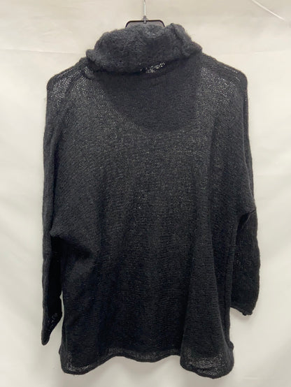 OTRAS.Jersey negro lana punto abierto T.M