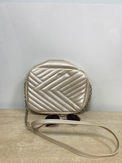 LEFTIES. Pearl-colored bag