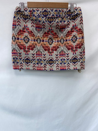 PULL&BEAR.Falda corta étnica flecos T.M