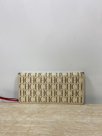 CAROLINA HERRERA. Cartera beige logo