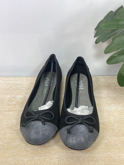 XTI. Bailarina negra y plateada T.39