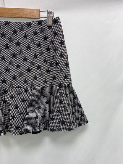 RED VALENTINO. Falda corta estrellas T.40