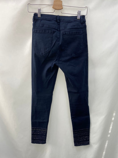 OTRAS.Vaqueros azules pedrería T.34