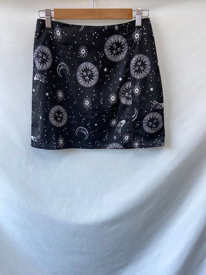 SHEIN.Falda estrellas T.36