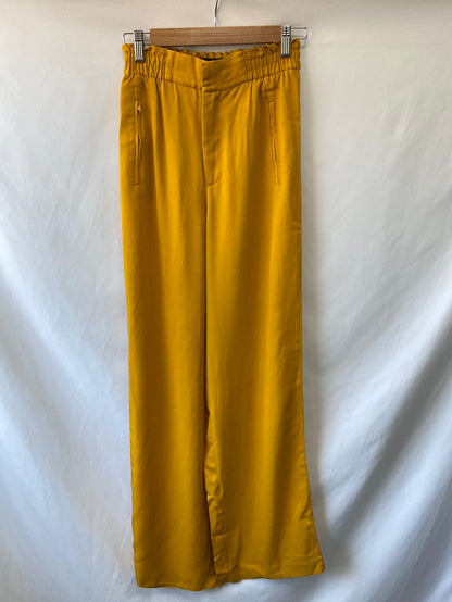 ZARA. Yellow Ts trousers