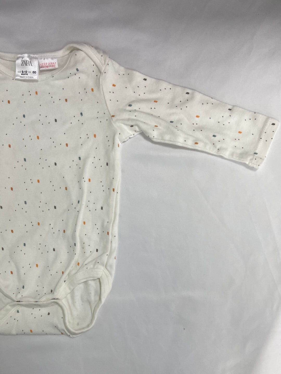 ZARA.White polka dot bodysuit S.9-12 months