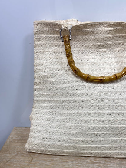 H&amp;M.Beige raffia bag with wooden handle