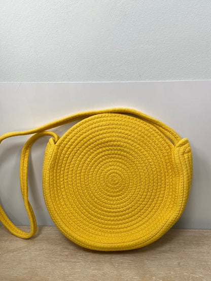 OTRAS.Bolso redondo amarillo