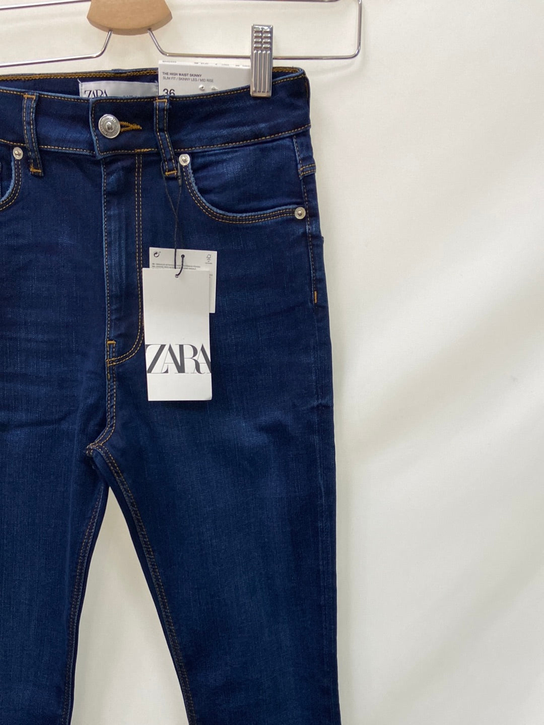 ZARA.Pantalones pitillo clásicos denim oscuro T.36